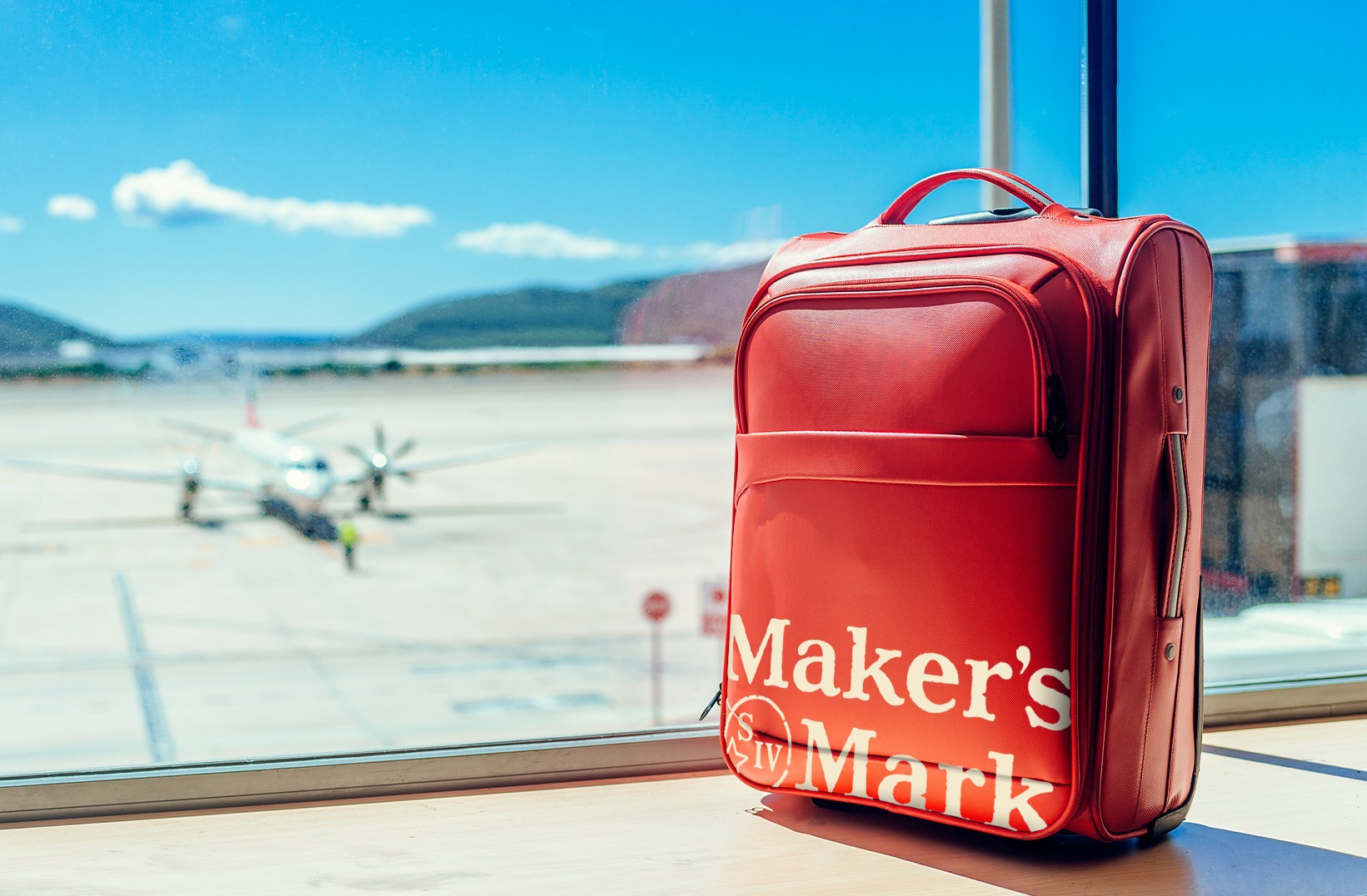 Traveling to Toast with Loved Ones This Holiday?<br />
If You’re Checking a Bag Because of Bourbon, Maker’s Mark May Pick Up the Fee